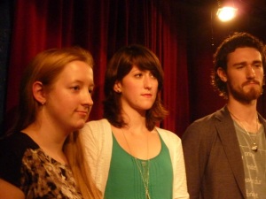Bonnie, Victoria and Brett (L-R) on stage for their reading